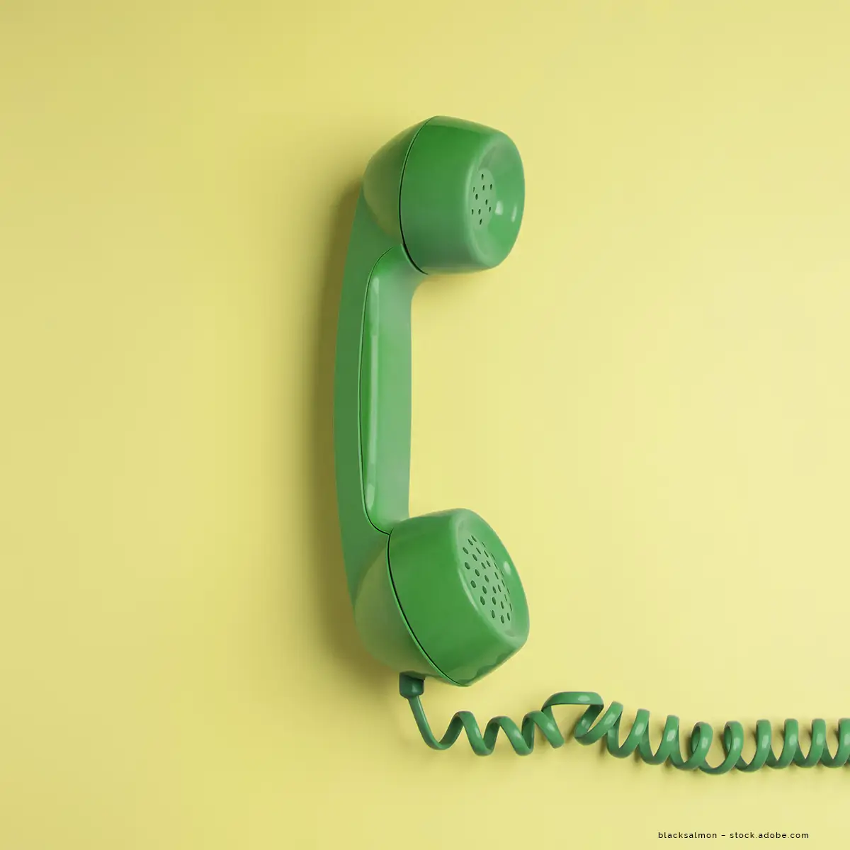 Notfalldienste der Region Bocholt, Rhede und Isselburg Ein grünes Telefon vor einem gelben Hintergrund.